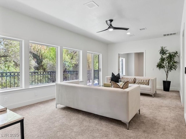 21 Sawgrass Ct, Las Vegas, NV 89113 - living room featuring light carpet, ceiling fan, baseboards, and recessed lighting