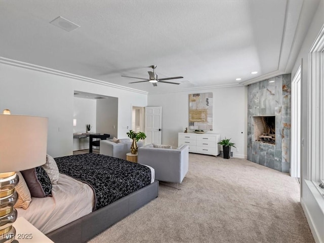 21 Sawgrass Ct, Las Vegas, NV 89113 - bedroom featuring light carpet, a fireplace, crown molding, recessed lighting, and a ceiling fan