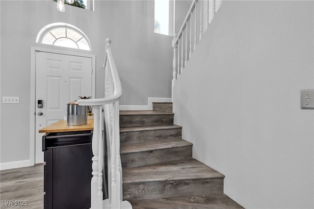 9585 Teton Diablo Ave, Las Vegas, NV 89117 - stairway featuring wood finished floors