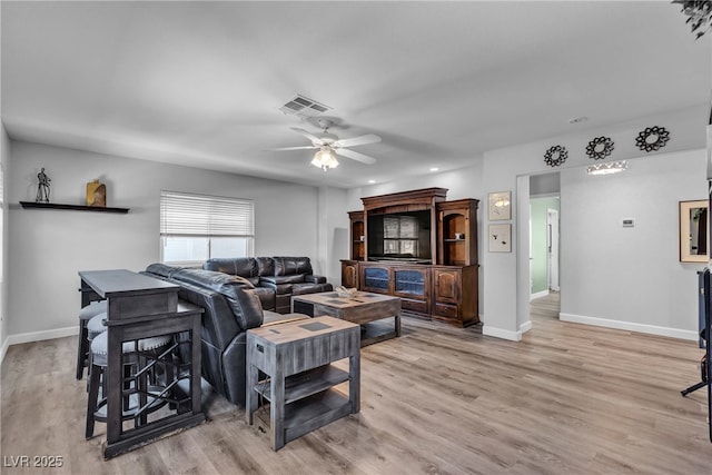 9585 Teton Diablo Ave, Las Vegas, NV 89117 - living room with baseboards, a ceiling fan, light wood-type flooring, and recessed lighting