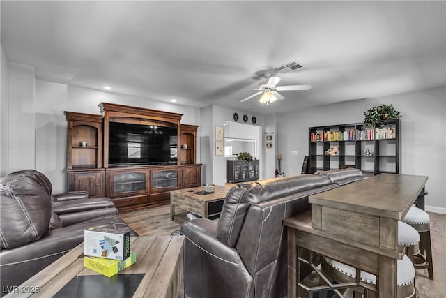 9585 Teton Diablo Ave, Las Vegas, NV 89117 - living area featuring ceiling fan, wood finished floors, and recessed lighting