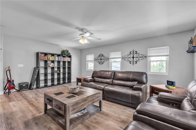 9585 Teton Diablo Ave, Las Vegas, NV 89117 - living area with plenty of natural light, ceiling fan, and light wood-style flooring