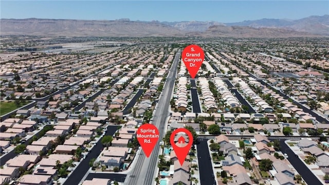 9585 Teton Diablo Ave, Las Vegas, NV 89117 - view of property location with nearby suburban area and a mountainous background