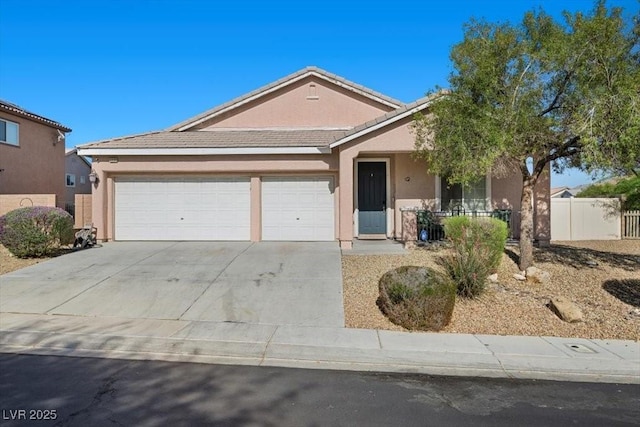 4308 Brazil Palm Ct, North Las Vegas, NV 89032 - ranch-style home featuring stucco siding, an attached garage, driveway, a tiled roof, and a porch