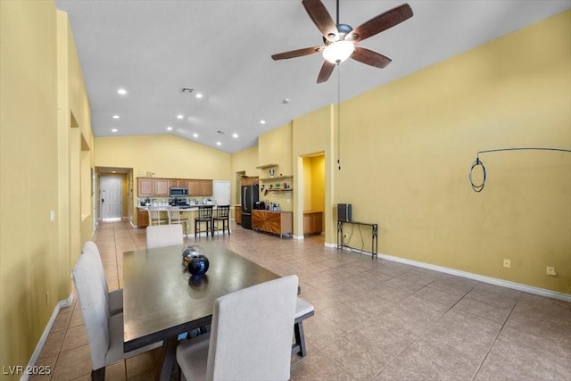 4308 Brazil Palm Ct, North Las Vegas, NV 89032 - dining room featuring ceiling fan, light tile patterned floors, baseboards, recessed lighting, and high vaulted ceiling