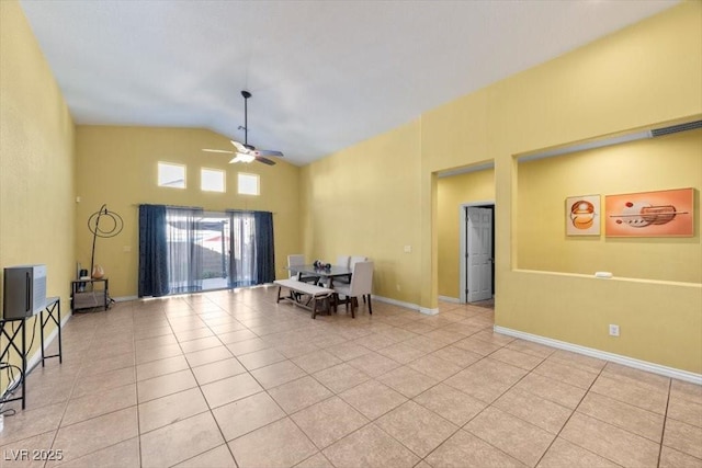 4308 Brazil Palm Ct, North Las Vegas, NV 89032 - dining space featuring ceiling fan, light tile patterned floors, high vaulted ceiling, and baseboards