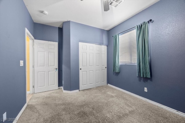 4308 Brazil Palm Ct, North Las Vegas, NV 89032 - unfurnished bedroom featuring carpet flooring, a closet, baseboards, and a ceiling fan