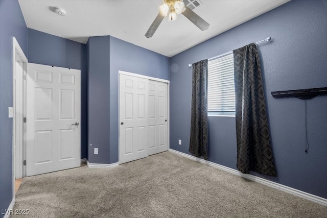 4308 Brazil Palm Ct, North Las Vegas, NV 89032 - unfurnished bedroom featuring carpet flooring, ceiling fan, baseboards, and a closet