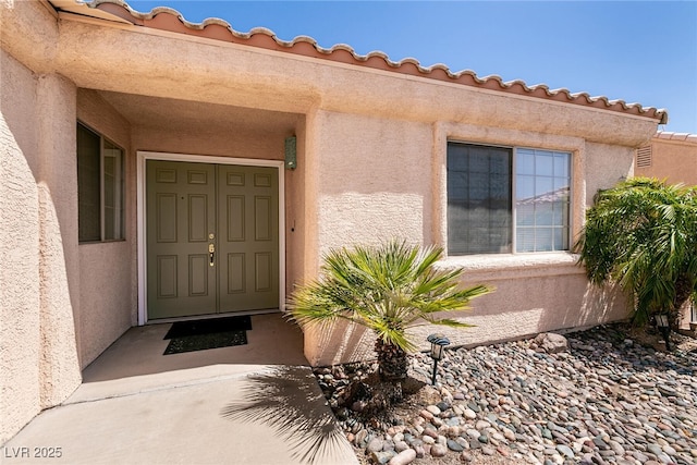 945 Stetson Dr, Henderson, NV 89002 - doorway to property with stucco siding