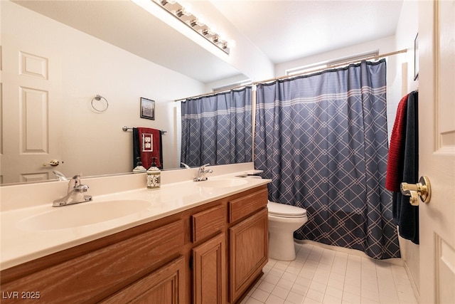 945 Stetson Dr, Henderson, NV 89002 - full bath with tile patterned floors, double vanity, toilet, and a shower with curtain