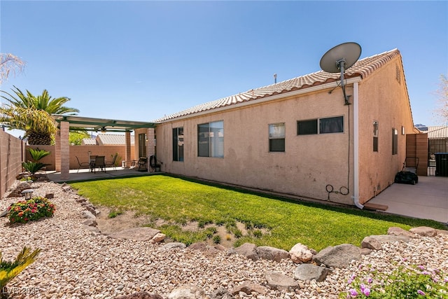 945 Stetson Dr, Henderson, NV 89002 - back of property with a patio area, stucco siding, and central air condition unit