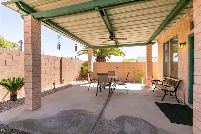 945 Stetson Dr, Henderson, NV 89002 - fenced backyard featuring outdoor dining space, a patio area, and ceiling fan