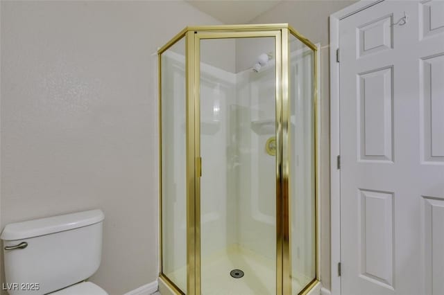 5424 Comchec Way Unit 105, Las Vegas, NV 89108 - bathroom featuring a shower stall and toilet