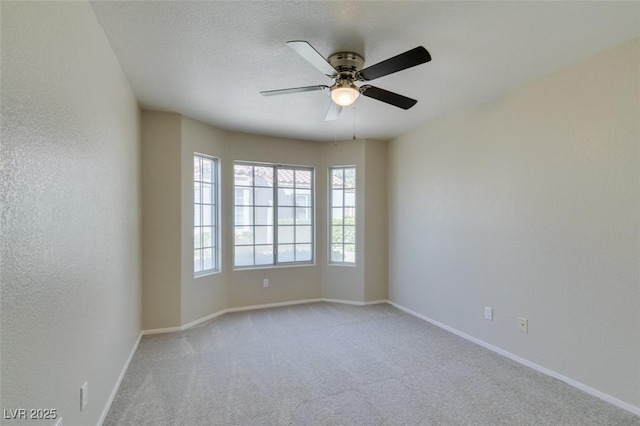 5424 Comchec Way Unit 105, Las Vegas, NV 89108 - spare room featuring ceiling fan, carpet floors, and baseboards
