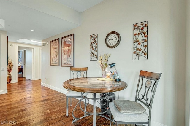 222 Karen Ave Unit 601, Las Vegas, NV 89109 - dining room featuring hardwood / wood-style flooring and baseboards