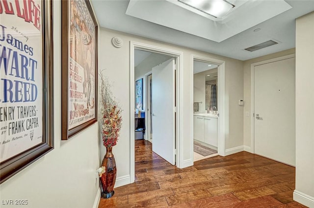 222 Karen Ave Unit 601, Las Vegas, NV 89109 - hallway with baseboards and wood finished floors