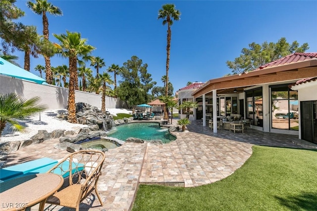 2101 Diamond Bar Dr, Las Vegas, NV 89117 - view of pool featuring an in-ground hot tub, a fenced backyard, and a patio area