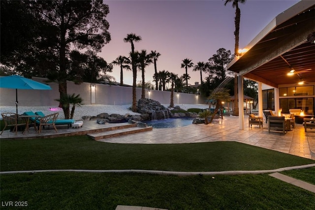 2101 Diamond Bar Dr, Las Vegas, NV 89117 - view of yard with a fire pit, a patio, and an outdoor pool