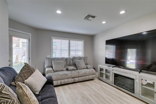 2101 Diamond Bar Dr, Las Vegas, NV 89117 - living room featuring light wood finished floors and recessed lighting