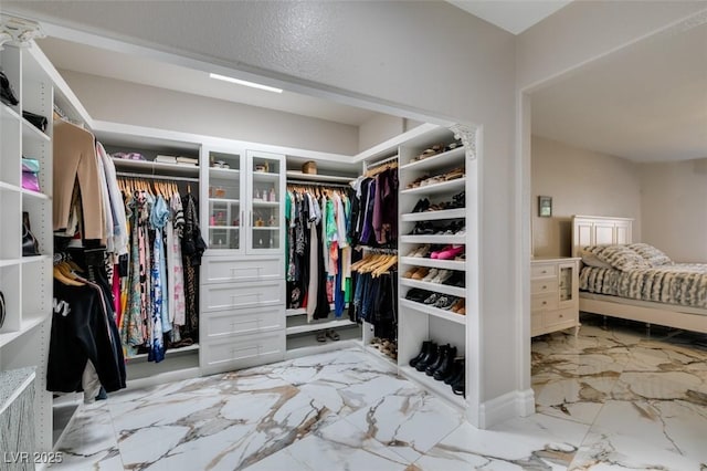 2101 Diamond Bar Dr, Las Vegas, NV 89117 - spacious closet featuring light marble finish floors