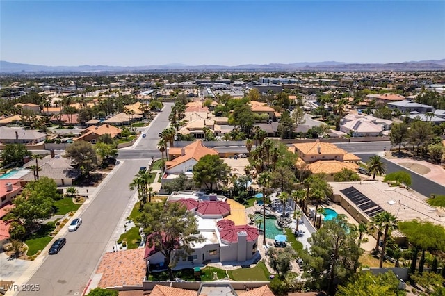 2101 Diamond Bar Dr, Las Vegas, NV 89117 - aerial view of residential area with a pool area and a mountain backdrop
