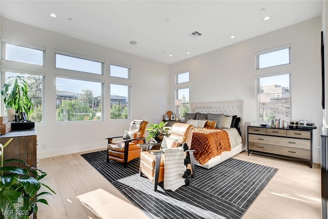 5155 Rock Daisy Dr, Las Vegas, NV 89135 - bedroom with multiple windows, light wood finished floors, recessed lighting, and baseboards