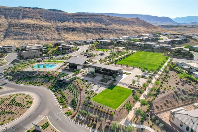 5155 Rock Daisy Dr, Las Vegas, NV 89135 - aerial view of property and surrounding area featuring mountains, a pool area, and nearby suburban area