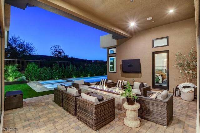 5155 Rock Daisy Dr, Las Vegas, NV 89135 - view of patio / terrace with an outdoor living space with a fire pit