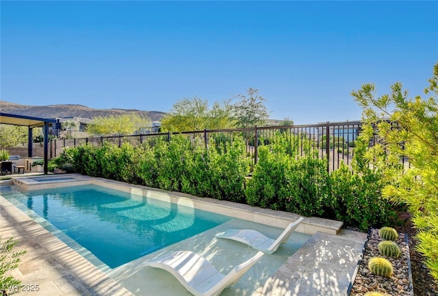 5155 Rock Daisy Dr, Las Vegas, NV 89135 - view of pool with a mountain view and a pool with connected hot tub
