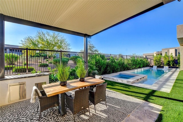 5155 Rock Daisy Dr, Las Vegas, NV 89135 - view of patio featuring an in-ground hot tub and outdoor dining space