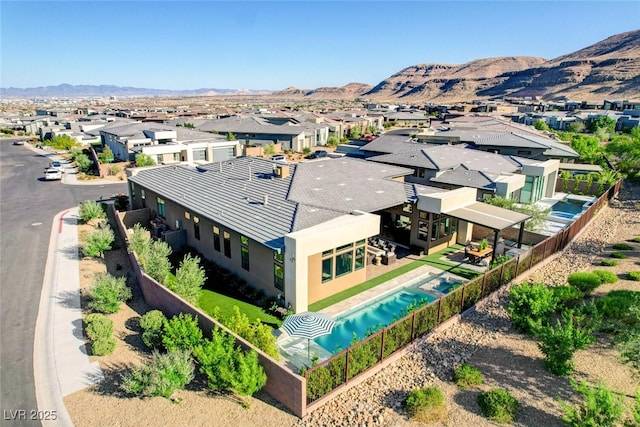 5155 Rock Daisy Dr, Las Vegas, NV 89135 - aerial view of residential area featuring a mountain backdrop and a pool