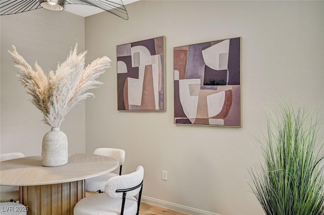 8000 Badura Ave Unit 1007, Las Vegas, NV 89113 - dining space with wood finished floors and baseboards