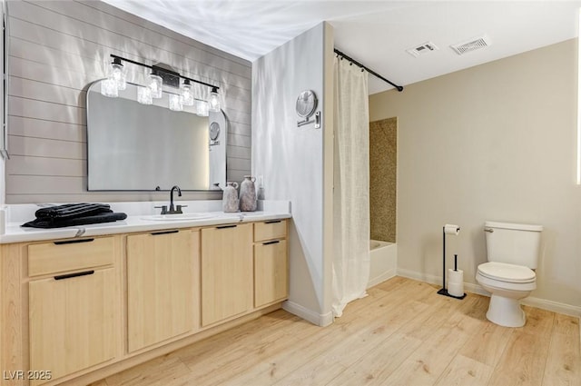 8000 Badura Ave Unit 1007, Las Vegas, NV 89113 - bathroom with vanity, wood finished floors, and shower / bath combo with shower curtain