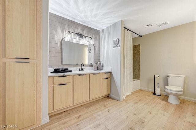 8000 Badura Ave Unit 1007, Las Vegas, NV 89113 - full bathroom featuring vanity, wood finished floors, and shower / tub combo