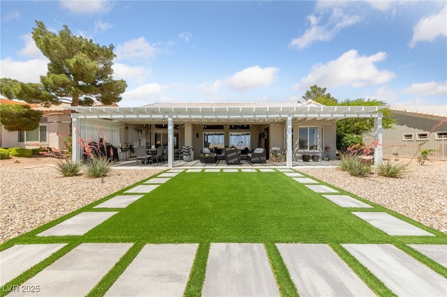 2816 High Range Dr, Las Vegas, NV 89134 - back of house with an outdoor living space, a pergola, stucco siding, a patio area, and a yard