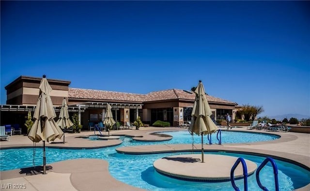 2816 High Range Dr, Las Vegas, NV 89134 - community pool with a patio area