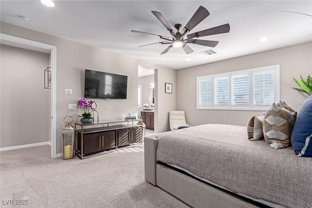 3929 Reyes Ave, Las Vegas, NV 89141 - bedroom featuring light carpet, baseboards, a ceiling fan, recessed lighting, and ensuite bathroom