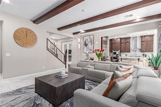 3929 Reyes Ave, Las Vegas, NV 89141 - living area featuring baseboards, beamed ceiling, light marble finish floors, and recessed lighting