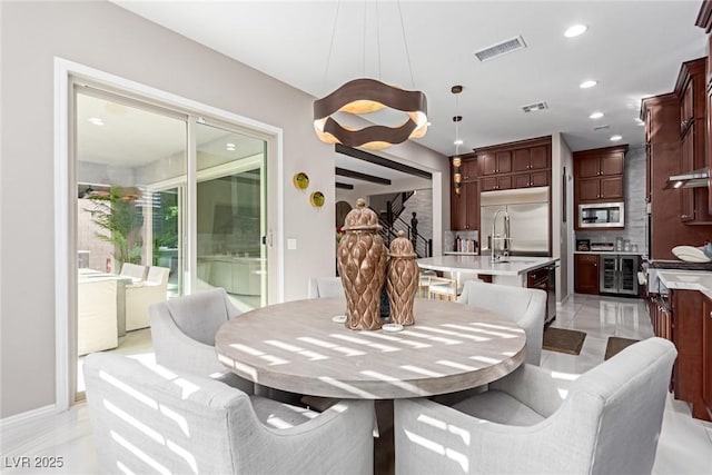 3929 Reyes Ave, Las Vegas, NV 89141 - dining area featuring recessed lighting and beverage cooler