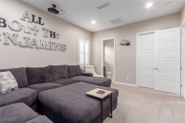 3929 Reyes Ave, Las Vegas, NV 89141 - living room featuring light carpet, recessed lighting, and baseboards