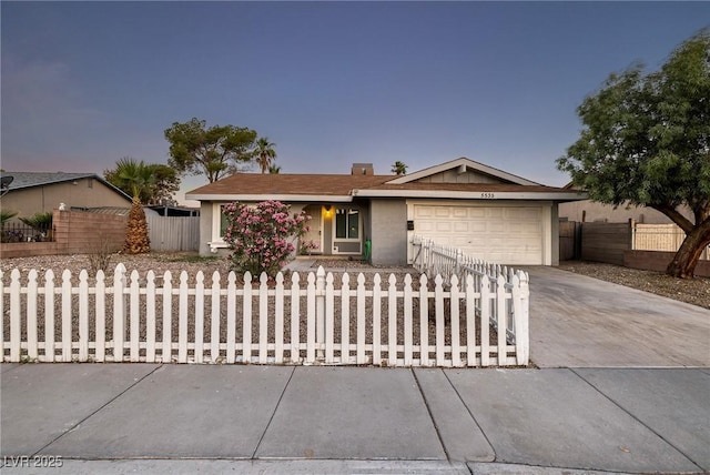 5535 Oxbow St, Las Vegas, NV 89119 - single story home featuring an attached garage, a fenced front yard, concrete driveway, and stucco siding