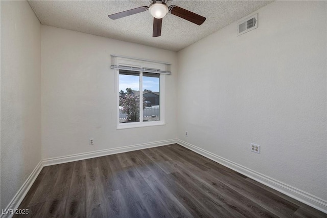 5535 Oxbow St, Las Vegas, NV 89119 - empty room featuring a textured ceiling, dark wood-style flooring, baseboards, and a ceiling fan