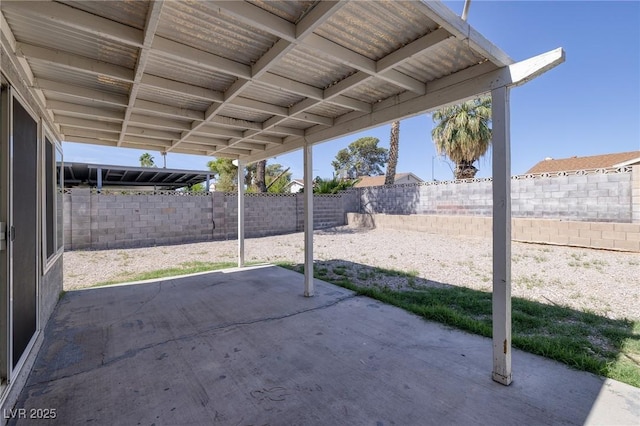5535 Oxbow St, Las Vegas, NV 89119 - fenced backyard with a patio