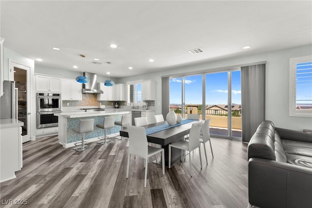 424 Vigo Port St, Las Vegas, NV 89138 - dining room with recessed lighting and dark wood-type flooring