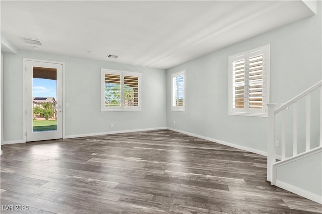 424 Vigo Port St, Las Vegas, NV 89138 - empty room with stairs, wood finished floors, and baseboards