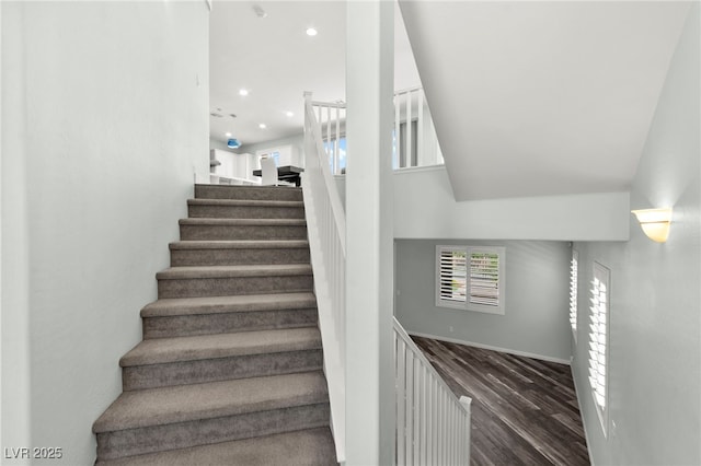 424 Vigo Port St, Las Vegas, NV 89138 - staircase with recessed lighting, wood finished floors, and a towering ceiling