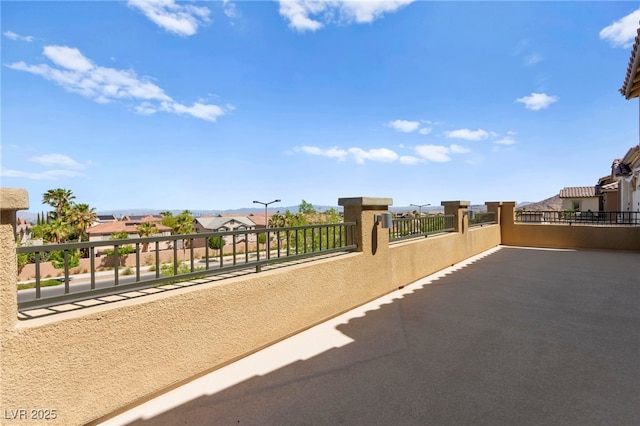 424 Vigo Port St, Las Vegas, NV 89138 - view of patio featuring a balcony and a residential view