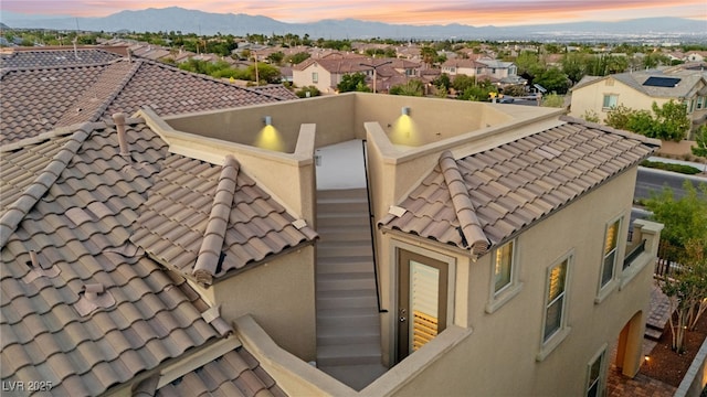 424 Vigo Port St, Las Vegas, NV 89138 - exterior space featuring a tile roof, a mountain view, a residential view, and stucco siding