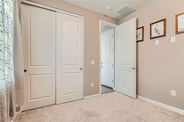 2507 Silent View Ave, Henderson, NV 89044 - unfurnished bedroom with light carpet, a closet, and baseboards