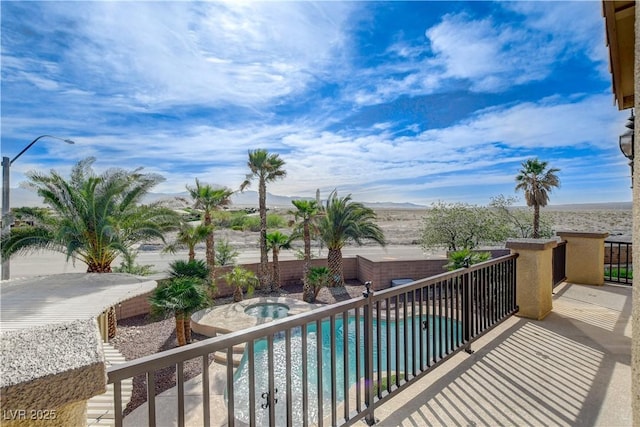5949 Casa Coronado Ave, Las Vegas, NV 89131 - balcony with view of pool and a mountain view
